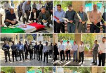 غبارروبی و عطر افشانی مزار شهدای شهر رودهن